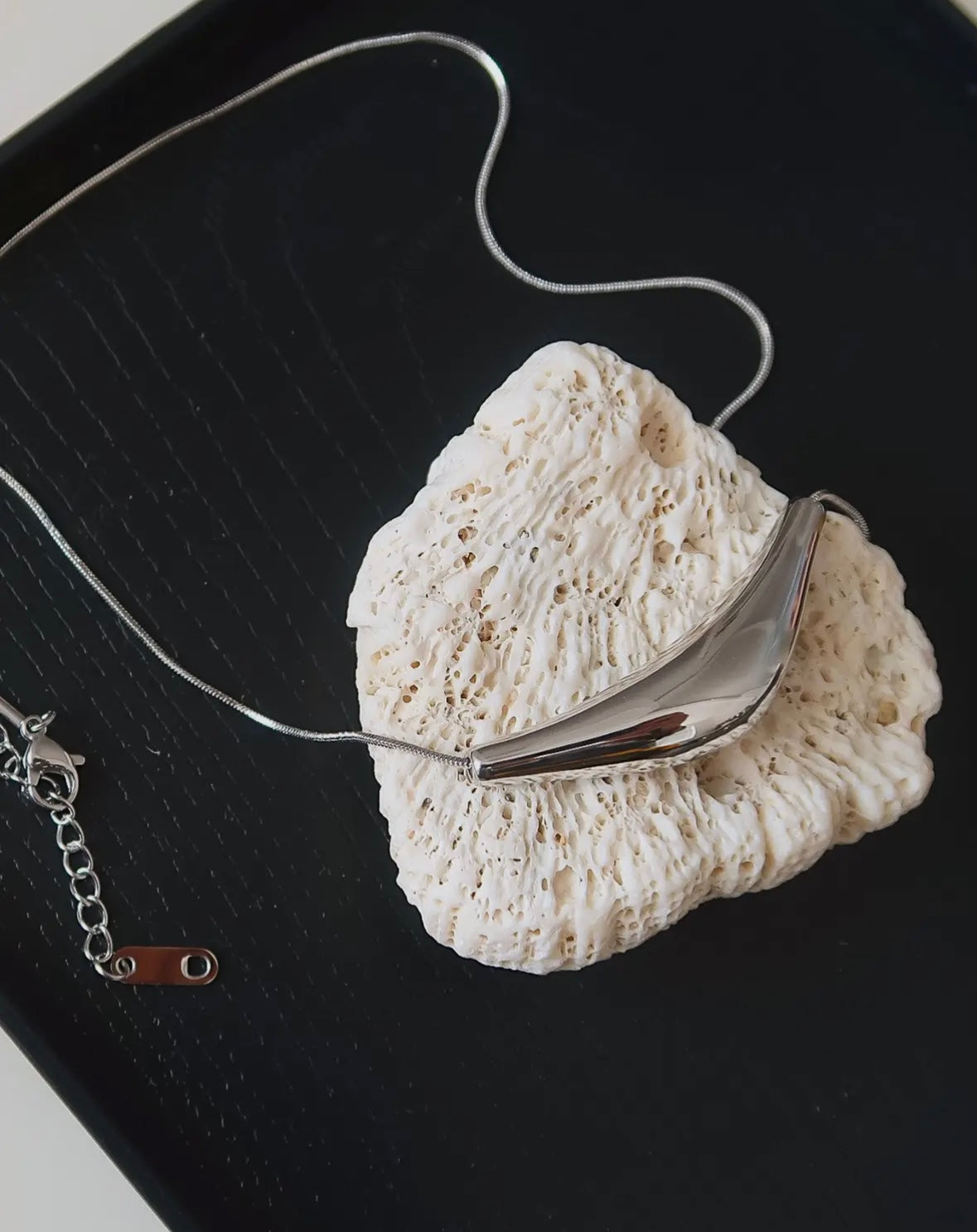 The Curved Sweater Necklace