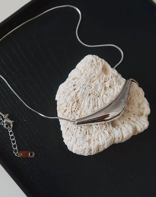 The Curved Sweater Necklace