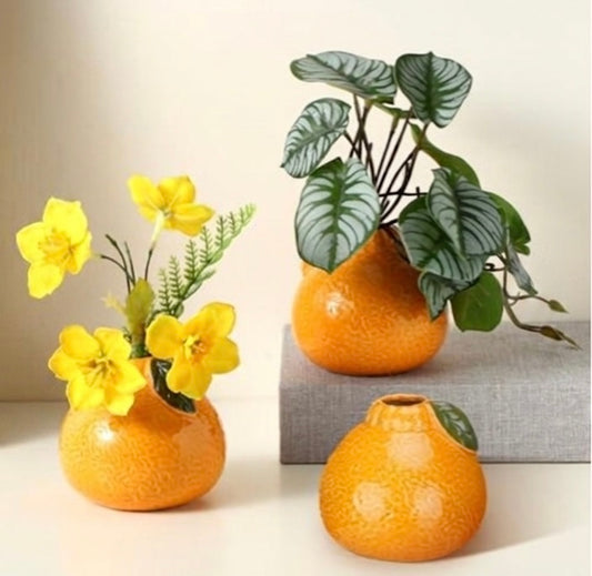 Ceramic Orange Vase with Green Leaves