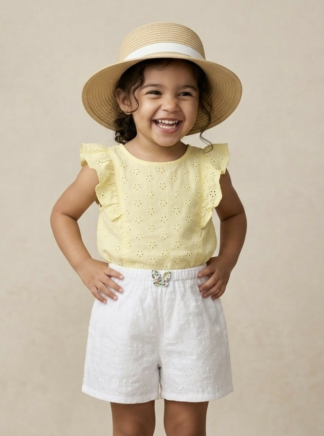 The Meadow Eyelet Shorts in Crisp White