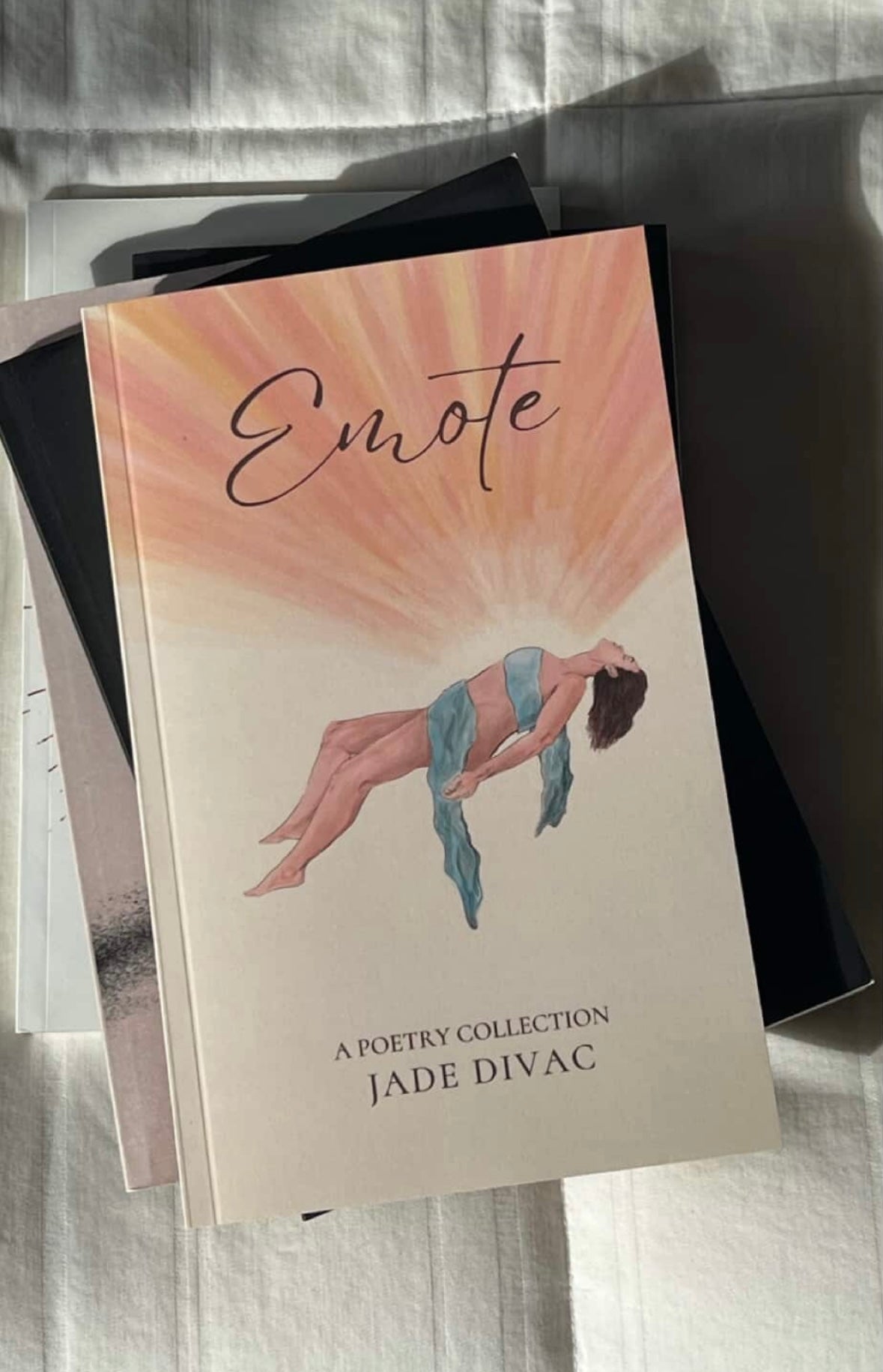 Emote (a poetry collection)