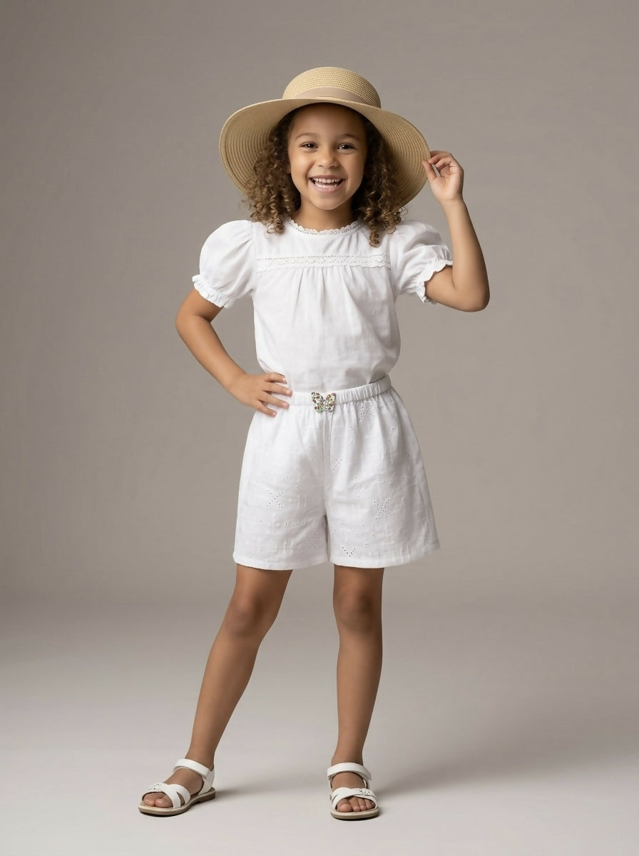 The Meadow Eyelet Shorts in Crisp White